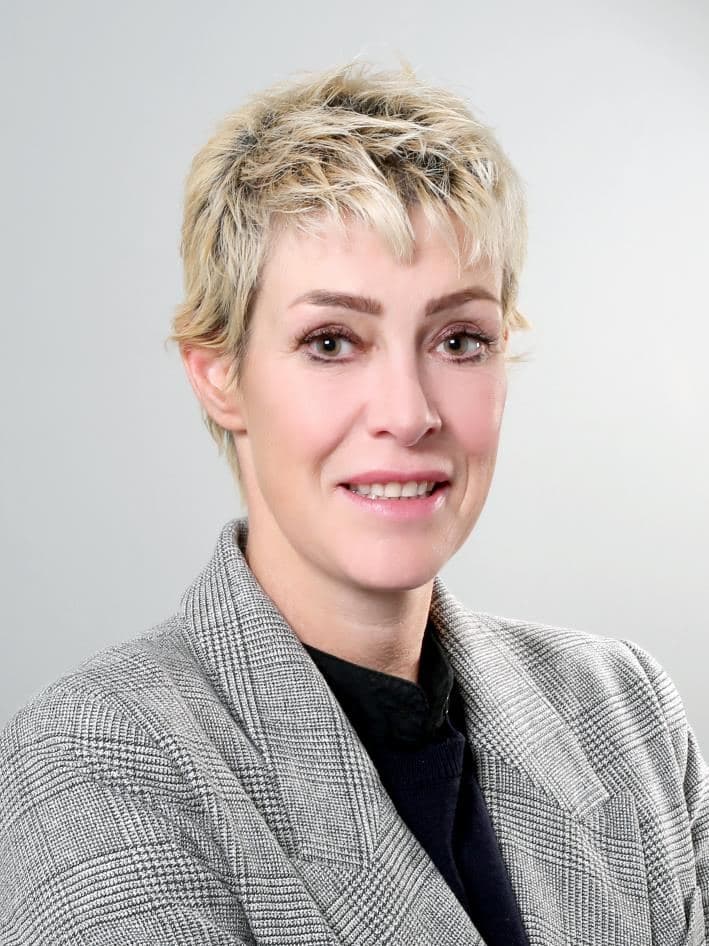 Heike, trainer en eigenaar van de sportschool